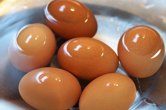 A glass bottle or jar with an opening slightly smaller than the egg (a milk bottle works well)