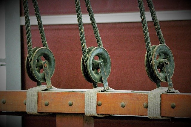 A pulley is a simple machine made up of a wheel with a groove around its edge and a rope (or chain) that fits into the groove.