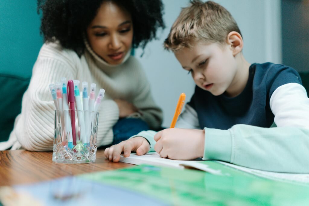 Loop families into the plan with clear, easy steps. Share five-minute routines they can do on busy nights, like trace and say on a wet sponge, or fridge magnet build and read. Celebrate small wins every week so the child feels proud and motivated. 