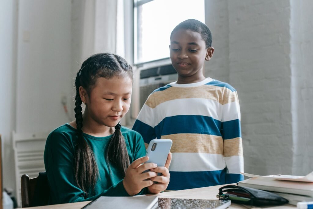 If your child brings a phone to school, talk with them about when and how to use it. Agree on clear rules like no phone use during class. Practice turning off notifications. Set it to “Do Not Disturb” mode. Encourage them to leave it in their locker or bag during lessons.